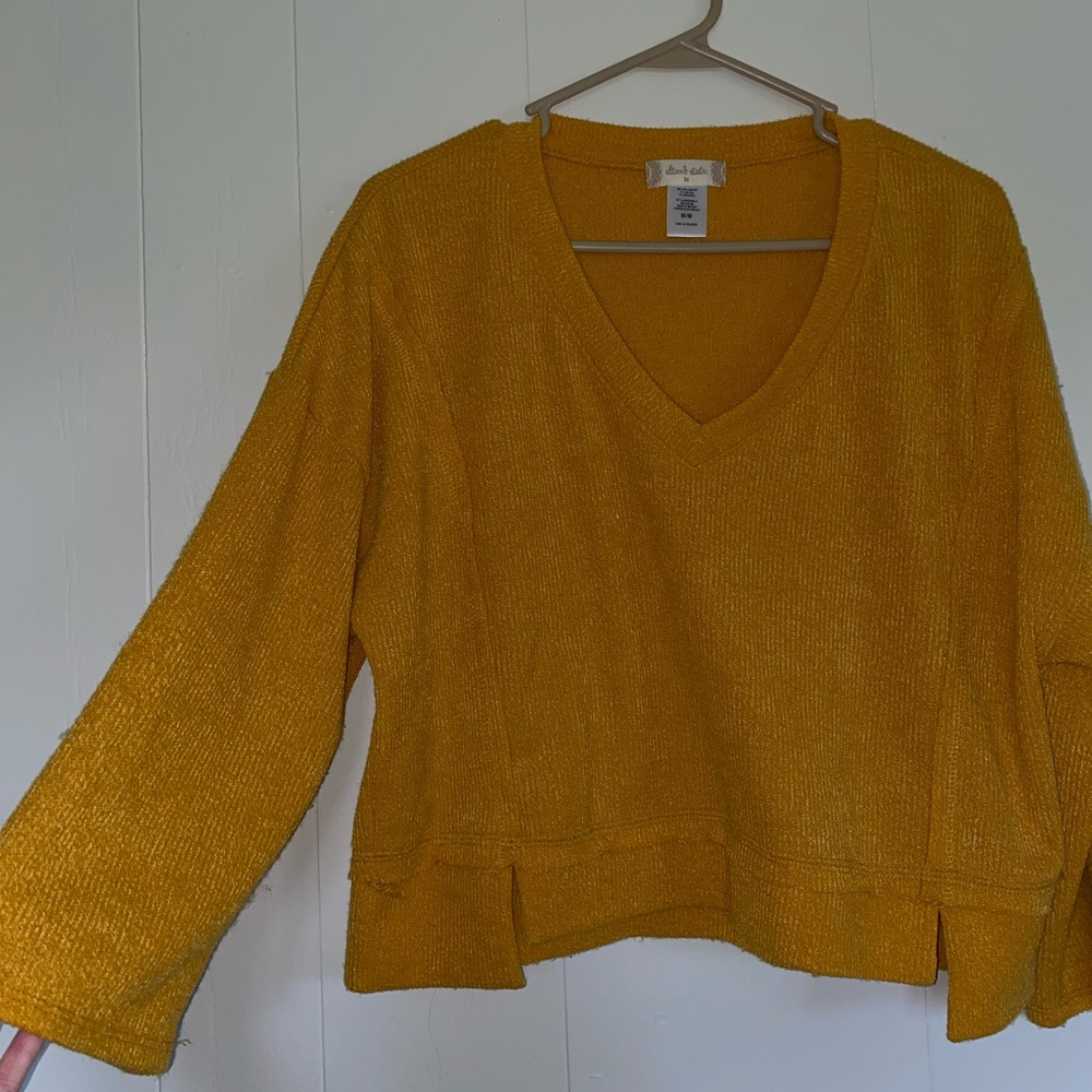 Mustard yellow sweater. Only worn once
